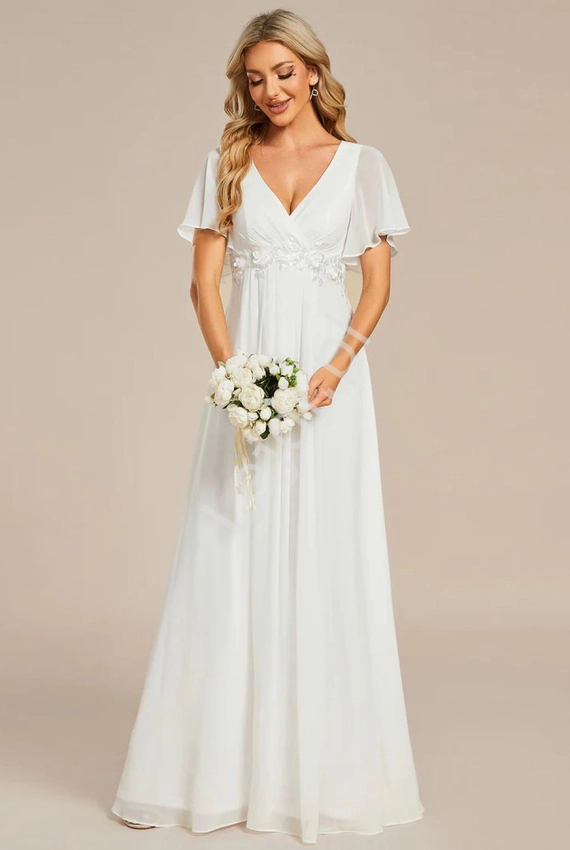 Biała sukienka ślubna w romantycznym stylu z zwiewnego szyfonu 1960