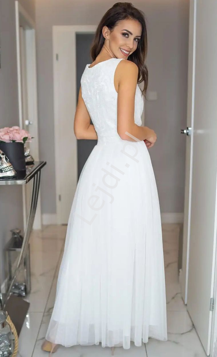 Biała tiulowa sukienka ślubna z koronkową górąBiała tiulowa sukienka ślubna z koronkową górą
