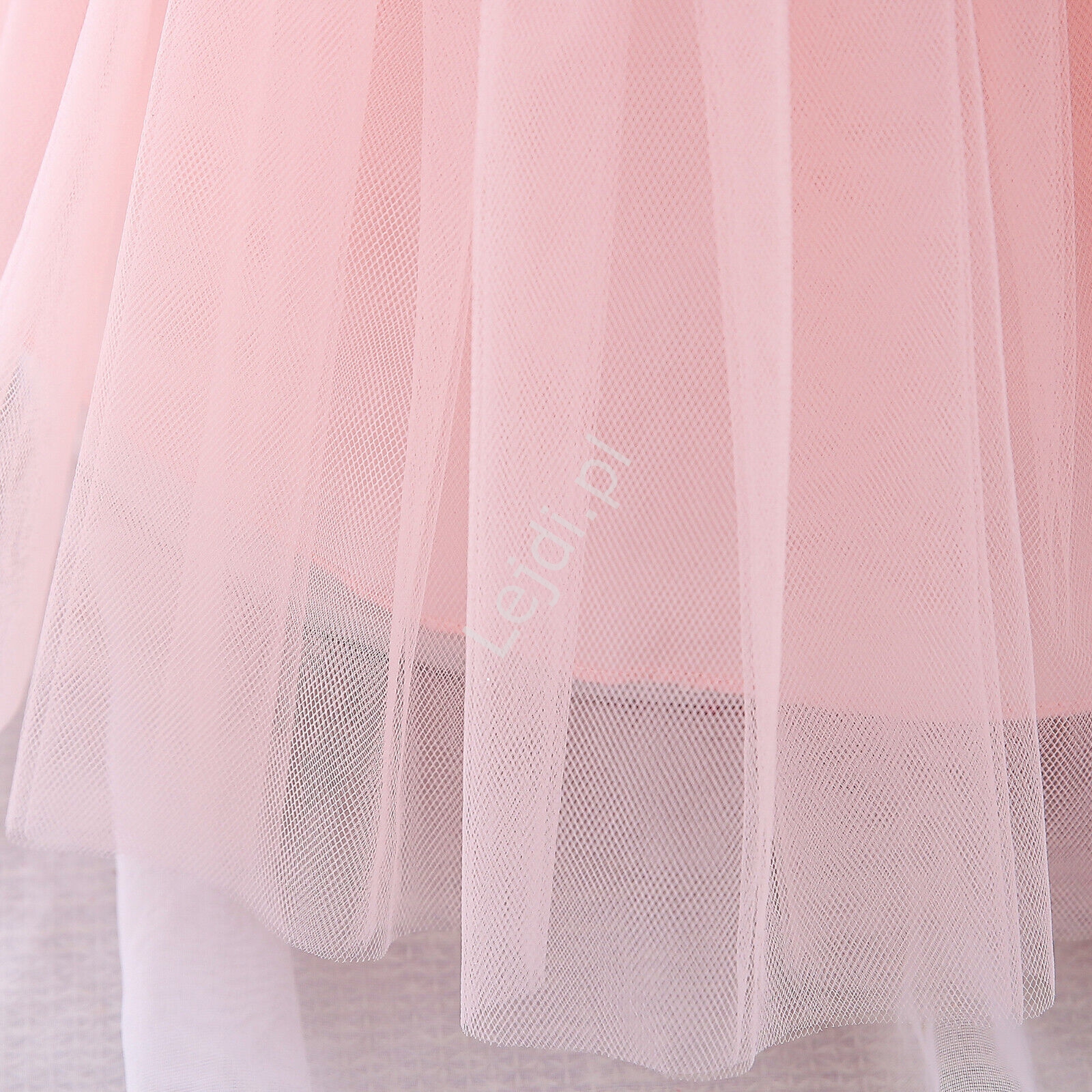 Elegancka jasno różowa sukienka dla dziewczynki z koronkowym zdobieniem 2089