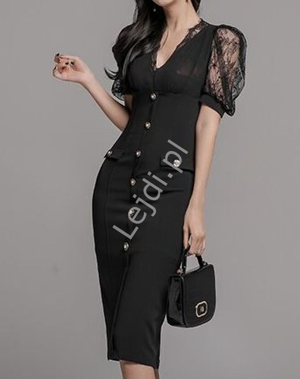 Elegancka sukienka ołówkowa w czarnym kolorz