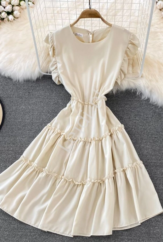 Sukienka z falbanami na spódnicy beżowa