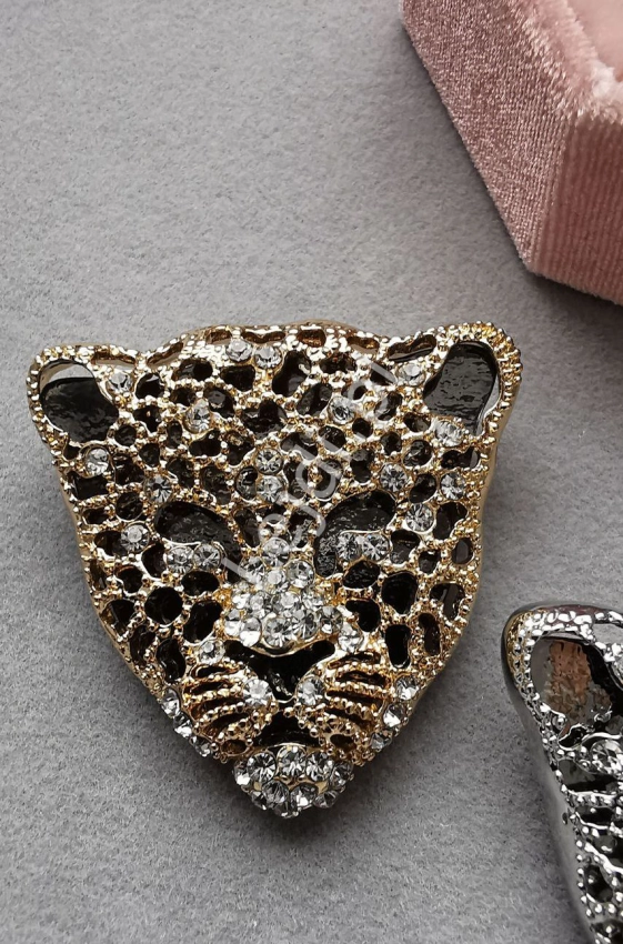Złota broszka pantera z kryształkami