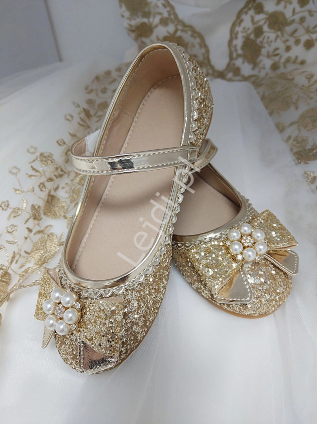 Złote buciki dla dziewczynki ze srebrnymi kryształkami i kokardą 186